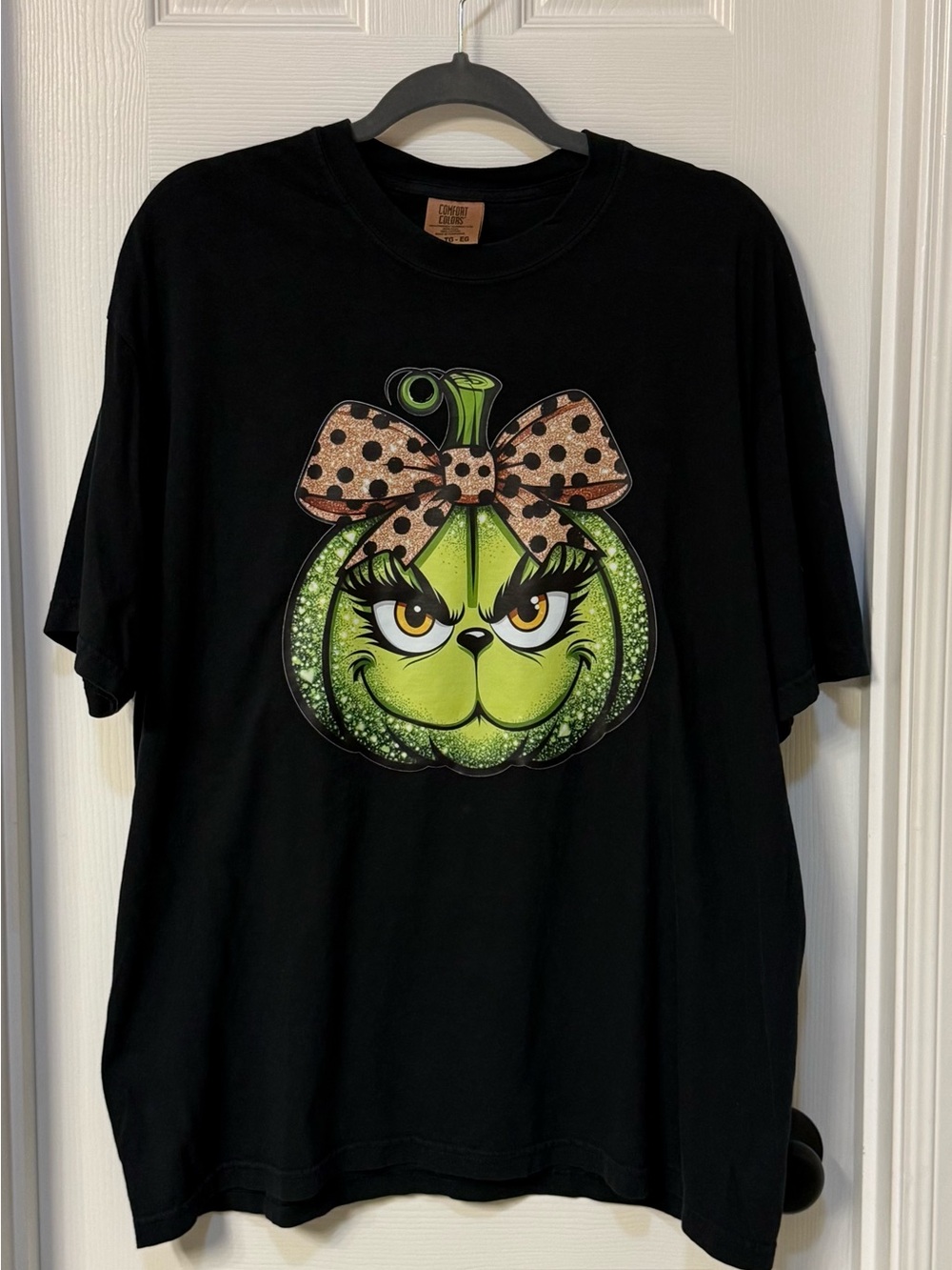 Comfort Colors Black Tee with Green Grinch Pumpkin and Polka Dot Bow